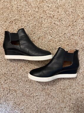 Women’s Black Perforated Slip-On Wedge Sneakers